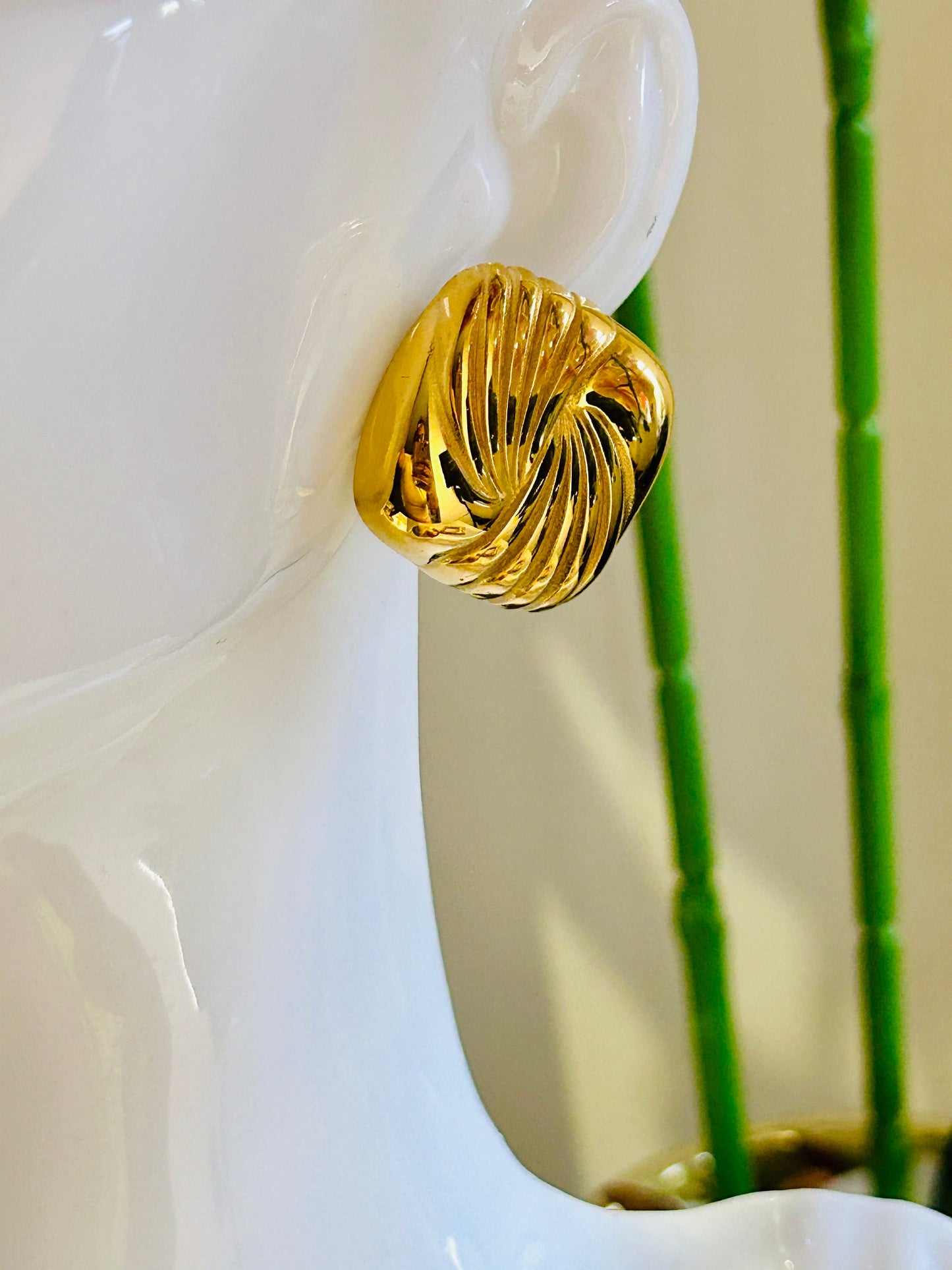 Square Spiral Vintage Earring with 18k gold plating on display.
