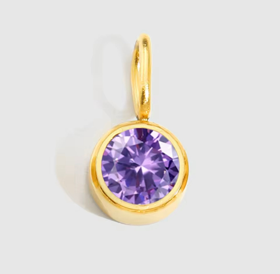 Gold-plated Birthstone Charm Necklace with purple gemstone pendant.
