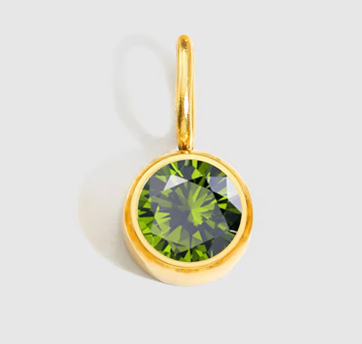 Gold-plated birthstone charm necklace with adjustable chain.