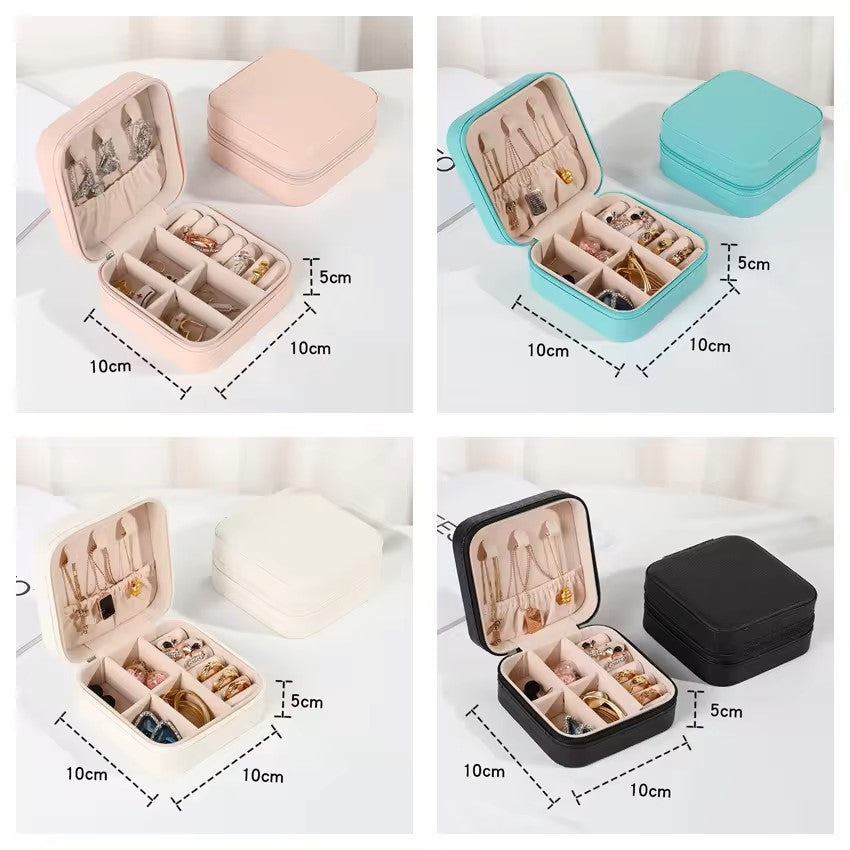 Portable leather small jewellery box with different colors, open to show organized compartments for rings and necklaces, size 10x10x5cm.