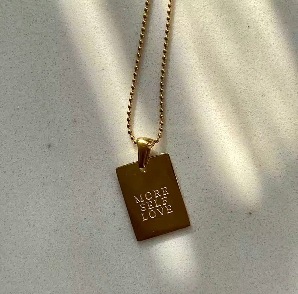 Empower Tag Necklace Collection