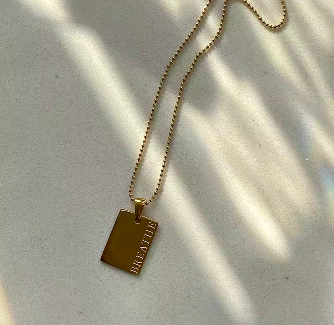 Empower Tag Necklace Collection